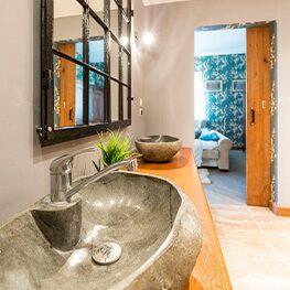 custom sink in a long bathroom vanity